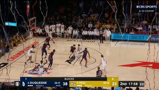 Confetti prematurely falls onto the court during Atlantic 10 tournament final between Duquesne and VCU.